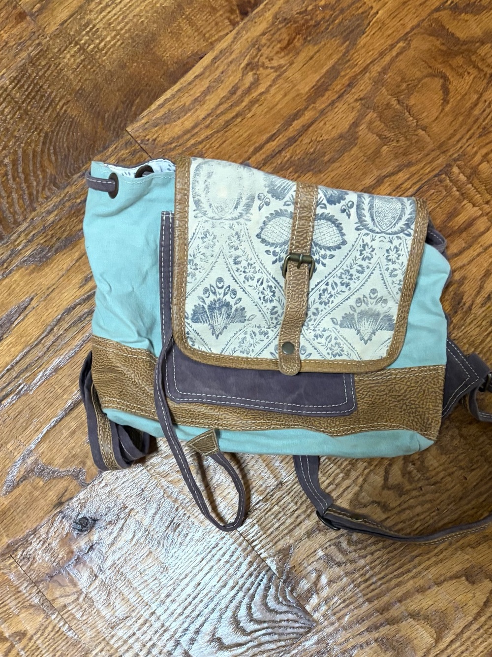 Myra Bag Teal Canvas Backpack with Brown Trim and Cream Patterned Flap